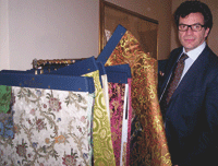 Gustavo De Negri with the textile samples from his last collection displayed at the 2008 Proposte fair. (Photos WIPO/S. Castonguay)